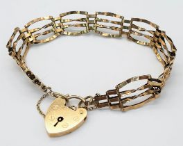 A Vintage 9K Yellow Gold Gate Bracelet with Heart Clasp. 18cm. 8g weight.
