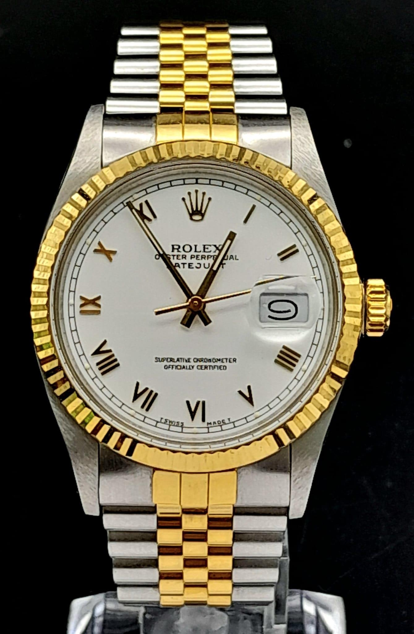 A Bi-Metal Rolex Oyster Perpetual Datejust Gents Watch. Gold and stainless steel bracelet and case -