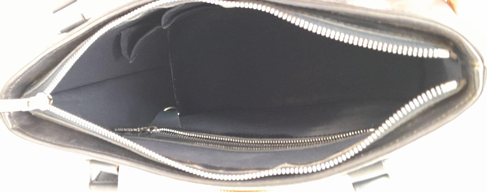 A Louis Vuitton Metallic Grey 'Stockton' Bag. Monogram leather exterior with silver-tone hardware - Image 8 of 9