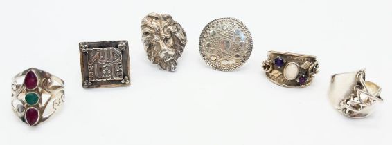 A Selection of Six Different Styled 925 Silver Rings, Different Sizes. Please see photos for finer
