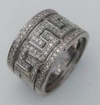 An Art Deco Style 9k White Gold and Diamond Band Ring. Diamond encrusted decoration. Size R. 8.33g