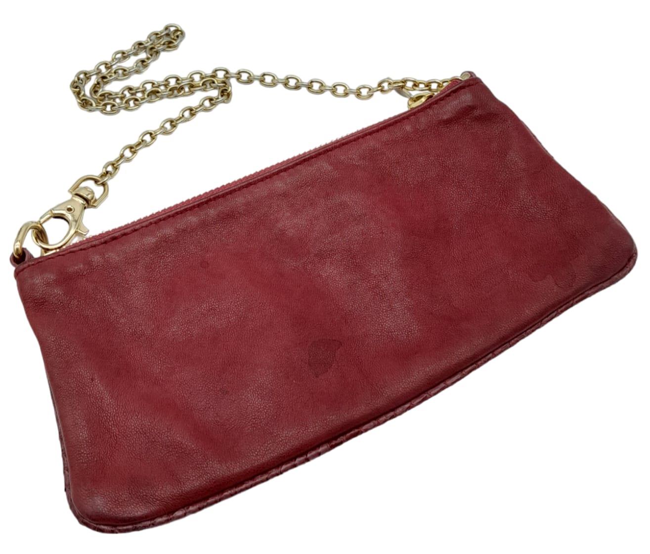 A Jimmy Choo Magenta Bag. Leather exterior with gold-tone hardware and chain strap. Canvas interior, - Image 3 of 11