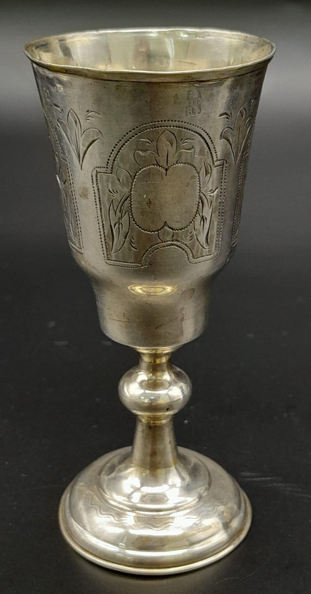 AN ANTIQUE SILVER RUSSIAN KIDDUSH CUP , HAND ENGRAVED . 44.5gms 10cms