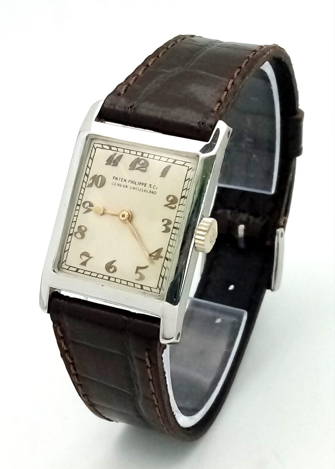 A RARE vintage Patek Philippe & Co watch with Breguet numbers. 27 x 23 mm white metal case. Cream