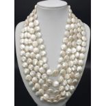 A Five Row Cultured 'Coin' Pearl' Necklace. 40-46cm.