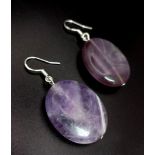 Lovely pair of Amethyst stone earrings with 925 Sterling Silver hooks. Amethyst is a protective