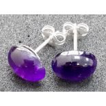 Pair of Rounded Purple Sapphire Sterling Silver stud earnings. Weight: 1g