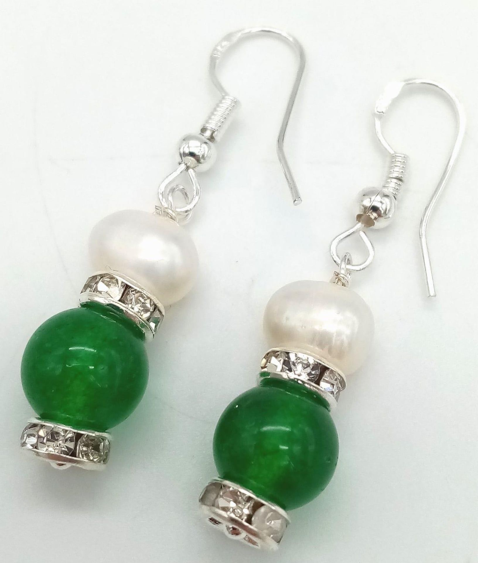 A Pair of Jade and Cultured Pearl Earrings.