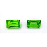 A very attractive, emerald cut, pair of PERIDOT stones. Approximately 10 carats each stone, with a