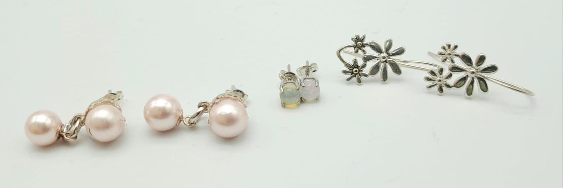 Trio of Sterling Silver Earrings. Featuring pair of double Pink Pearl drops, Floral Silver drops and