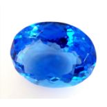 A fabulous, large (51.2 carats) Blue TOPAZ. Oval cut with excellent colour saturation and