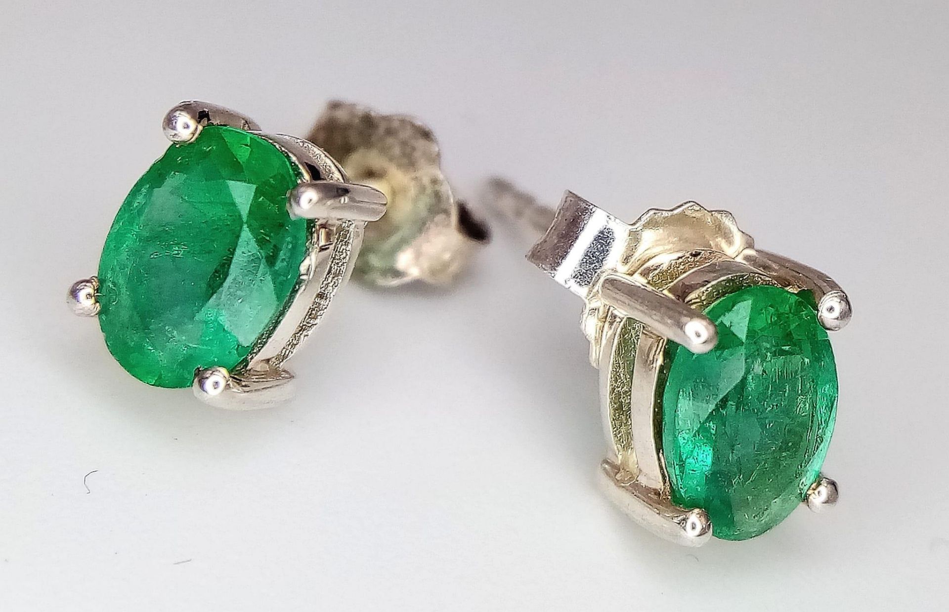 A Pair of Emerald 925 Silver Stud Earrings.