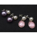 Two pairs of Sterling Silver Pearl earrings. One pair featuring a pretty pink gemstone addition