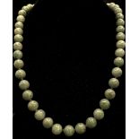 A Vintage Jade Bead Necklace. 62cm length.