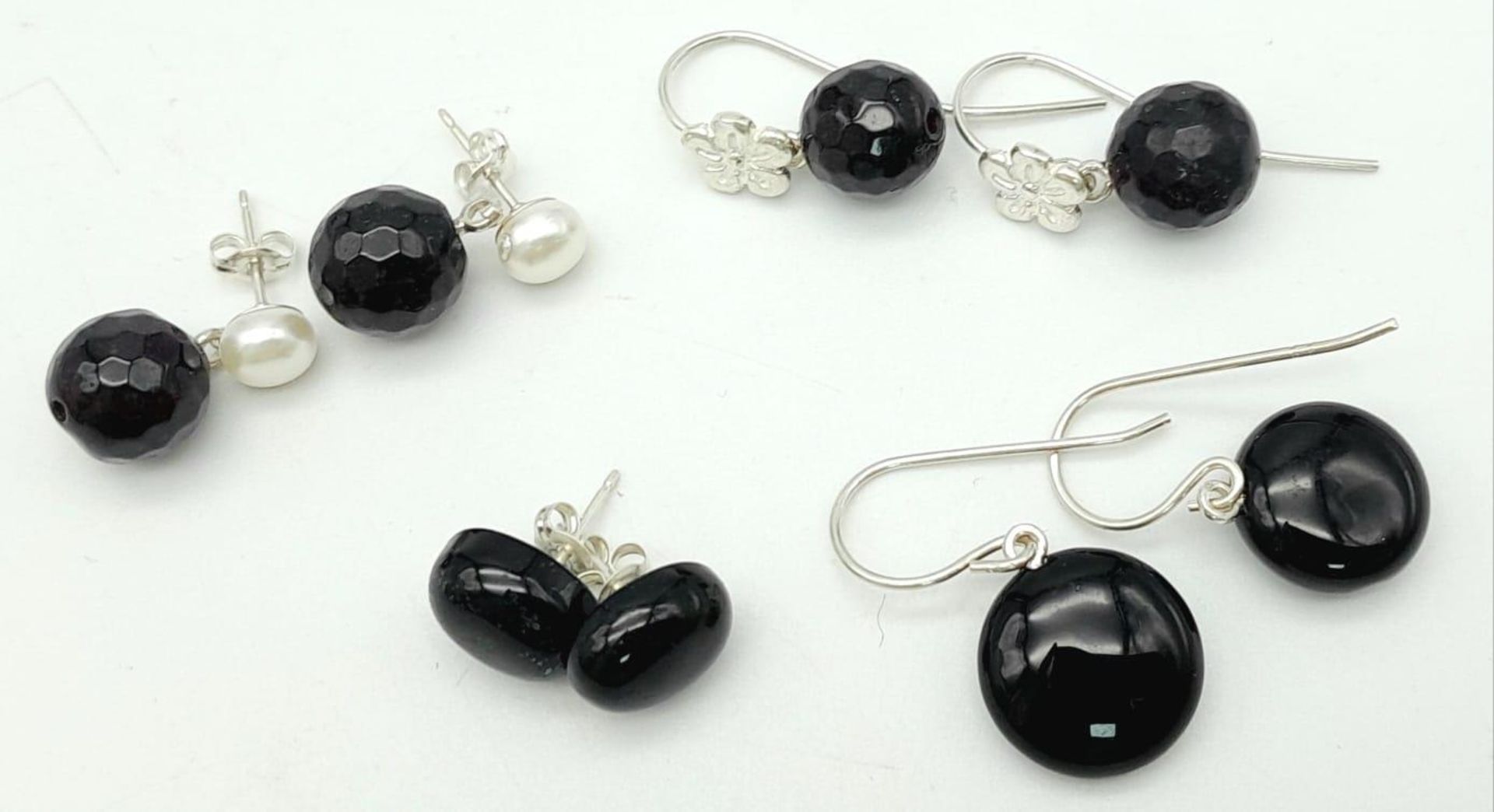 Collection of Sterling Silver Earrings with Black Gemstones. 4 various designs, a wonderful mix of