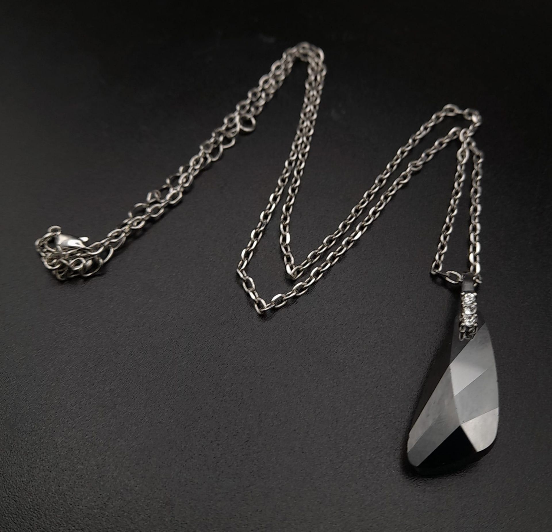 A silver with smoky quartz necklace. Total weight 6.82 grams. Total length 45 cm.