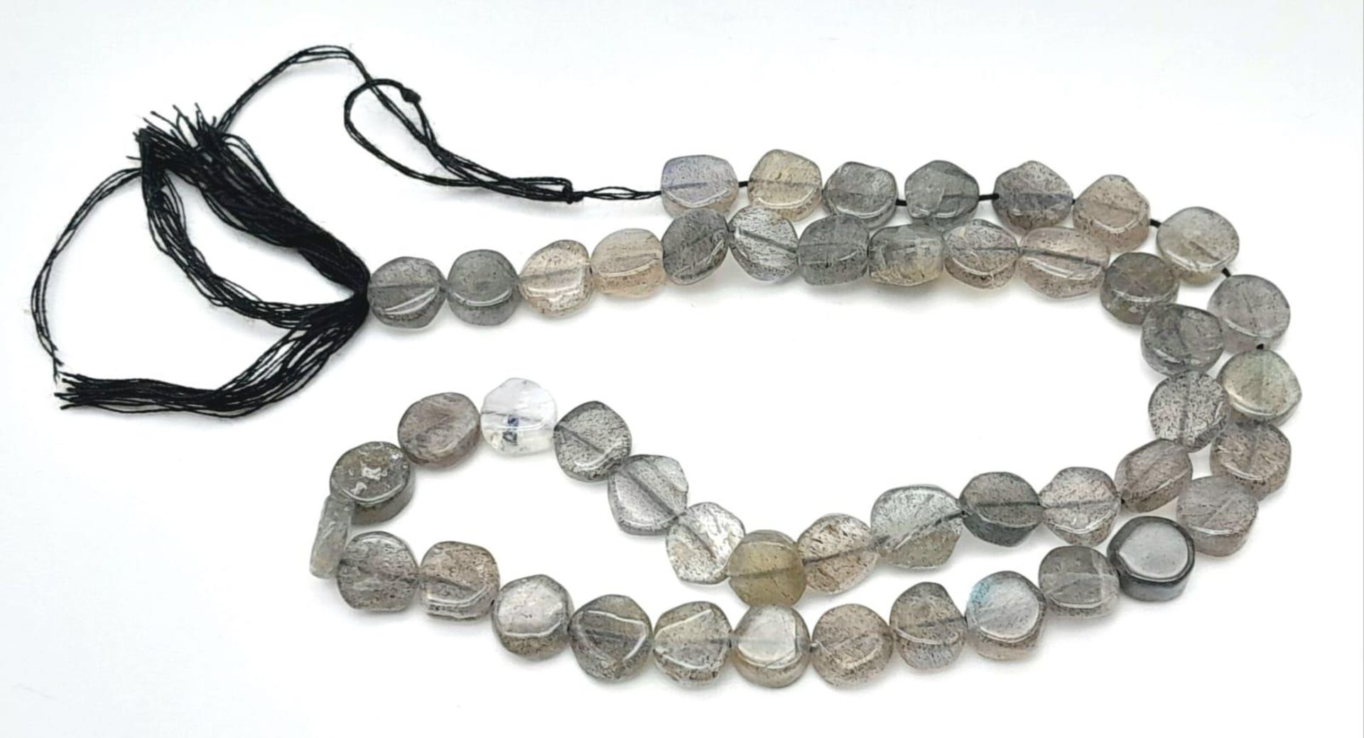 A string of labradorite stones, various shapes 35cm long approx