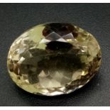 A 10.85 Ct Faceted Citrine in Oval Shape with GLI Certification.
