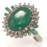 A 6.10ct Emerald Ring with 0.83ct Diamond Accents on 925 Silver. Ring Size P, Total Weight 7.70