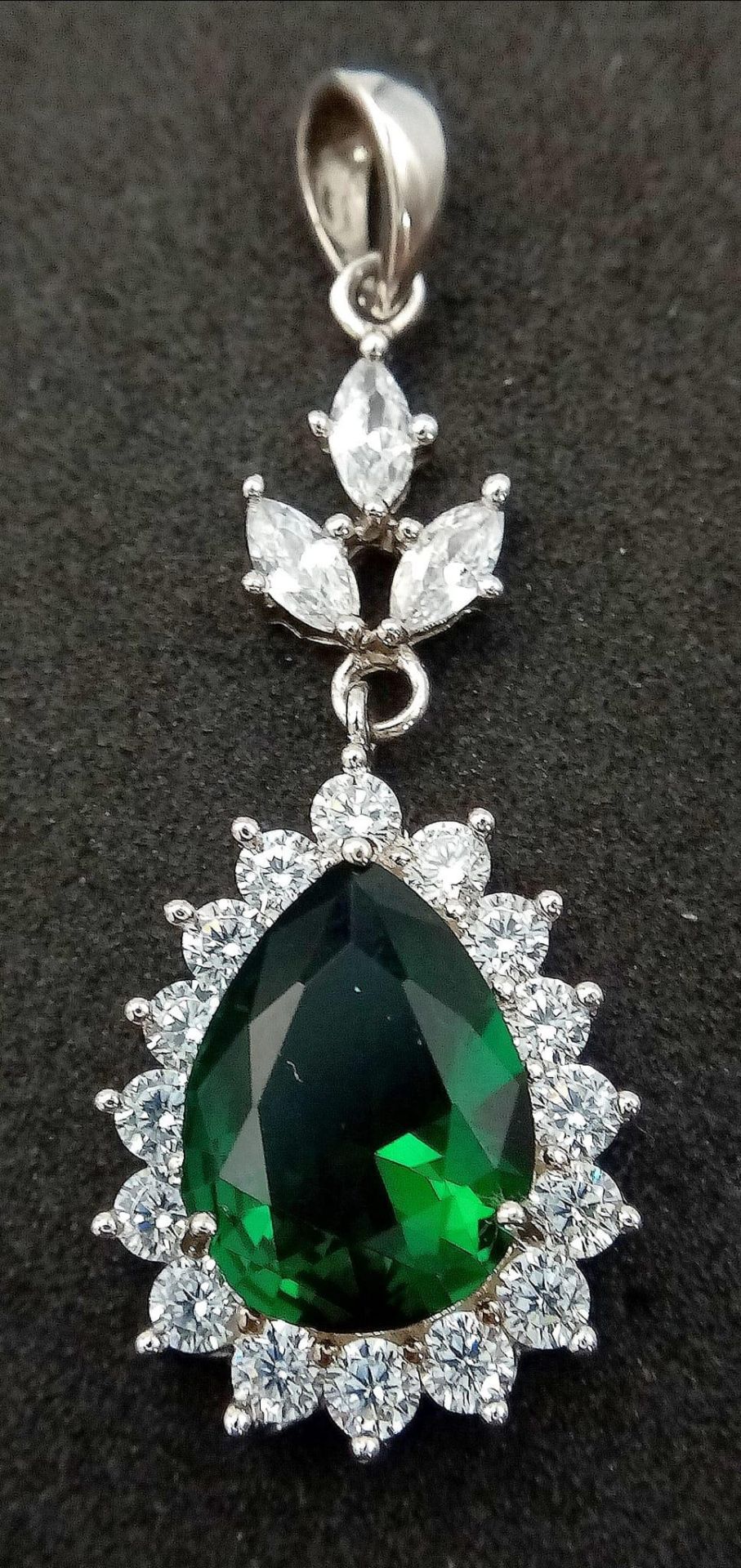 A Green and White Stone Pendant on 925 Silver.