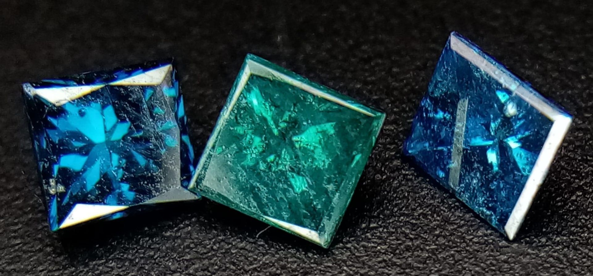 A Small Parcel of 0.78ctw Fancy Blue Diamonds - Three diamonds in total.