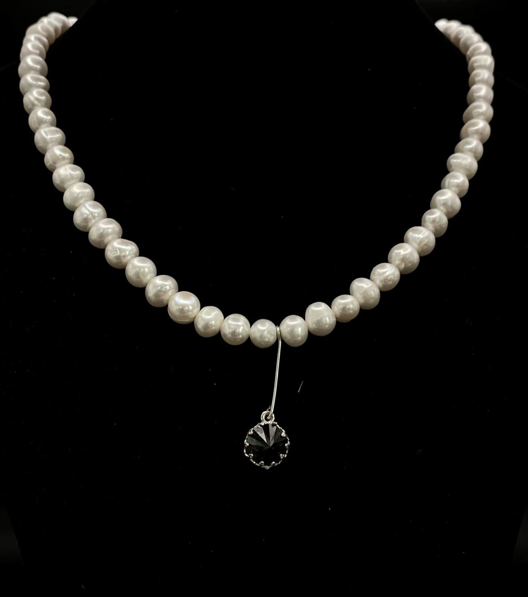 Bright Sterling Silver Cultured Pearl Necklace and Bracelet set. Necklace features an elegant dark