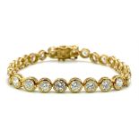 A Gilded 925 Sterling Silver CZ Tennis Bracelet. 16cm