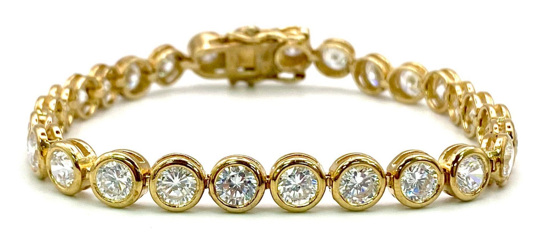 A Gilded 925 Sterling Silver CZ Tennis Bracelet. 16cm