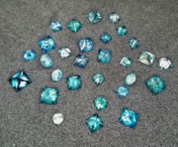 A 3.91ctw Parcel of Fancy Blue Diamonds.