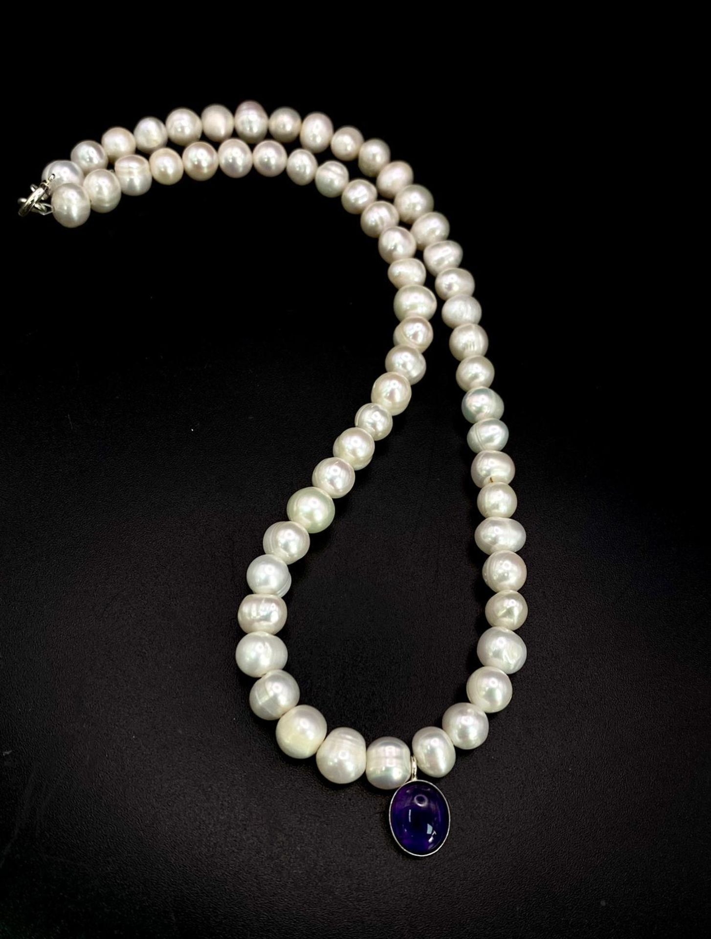 Classic Cultured Pearl Sterling Silver Necklace featuring a rounded Amethyst Stone Pendant.