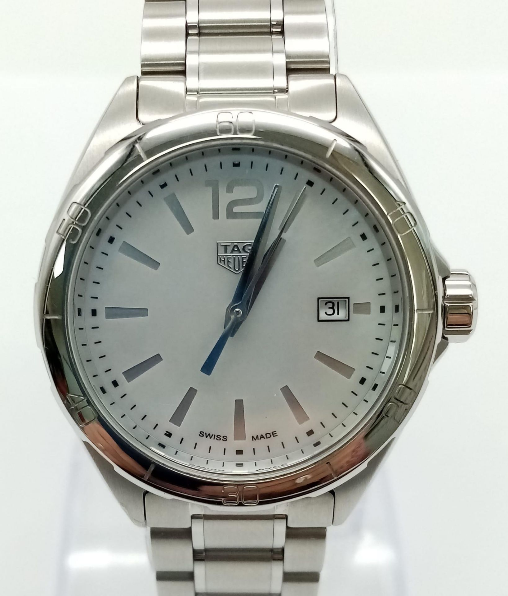 A Tag Heuer Formula 1 Ladies Quartz Watch. Stainless steel bracelet and case - 33mm. Mother of pearl