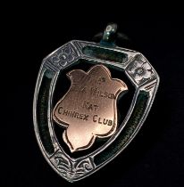 A 1929 Sterling Silver Watch Fob Ornament with Gold Plate Centre. Birmingham hallmarks.