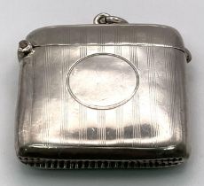 An Antique Sterling Silver Vesta Case. Machine tooled decoration with empty cartouche. Hallmarks for