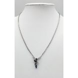 A 14K WHITE GOLD NECKLACE WITH DIAMONDS AND SAPPHIRES. (WOULD MAKE A LOVELY SET WITH THE PREVIOUS