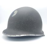 WW2 US Front Split Seam M1 Helmet with insignia of the 29 th Infantry Division.