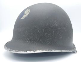 WW2 US Front Split Seam M1 Helmet with insignia of the 29 th Infantry Division.