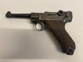A Very Collectible Deactivated German WW1 Era Luger 9mm Pistol. DWM production mark. Date mark of