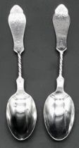 Pair of Sterling Silver Twisted Handle Monogrammed Teaspoons. Hallmarked with a Lion and Silver.