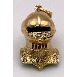 A 9K Gold and Diamond Knights Helmet Pendant! 3cm. 6.2g total weight.