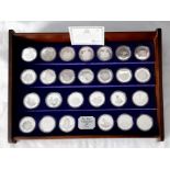 A Limited Edition New Elizabethan Age Set of 26 Solid Sterling Silver Coins. Made by the