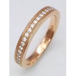 A 18K ROSE GOLD DIAMOND BAND RING DESIGNED BY CHRIS AIRE-DESIGNER TO THE CELEBRITIES 5.6G SIZE R/S