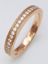 A 18K ROSE GOLD DIAMOND BAND RING DESIGNED BY CHRIS AIRE-DESIGNER TO THE CELEBRITIES 5.6G SIZE R/S