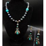 A very unusual large, natural, Tahitian black pearl and turquoise necklace and earrings set,