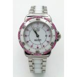 A Tag Heuer Formula 1 Amethyst Quartz Ladies Watch. Ceramic and stainless steel bracelet and