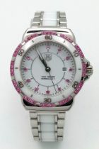 A Tag Heuer Formula 1 Amethyst Quartz Ladies Watch. Ceramic and stainless steel bracelet and