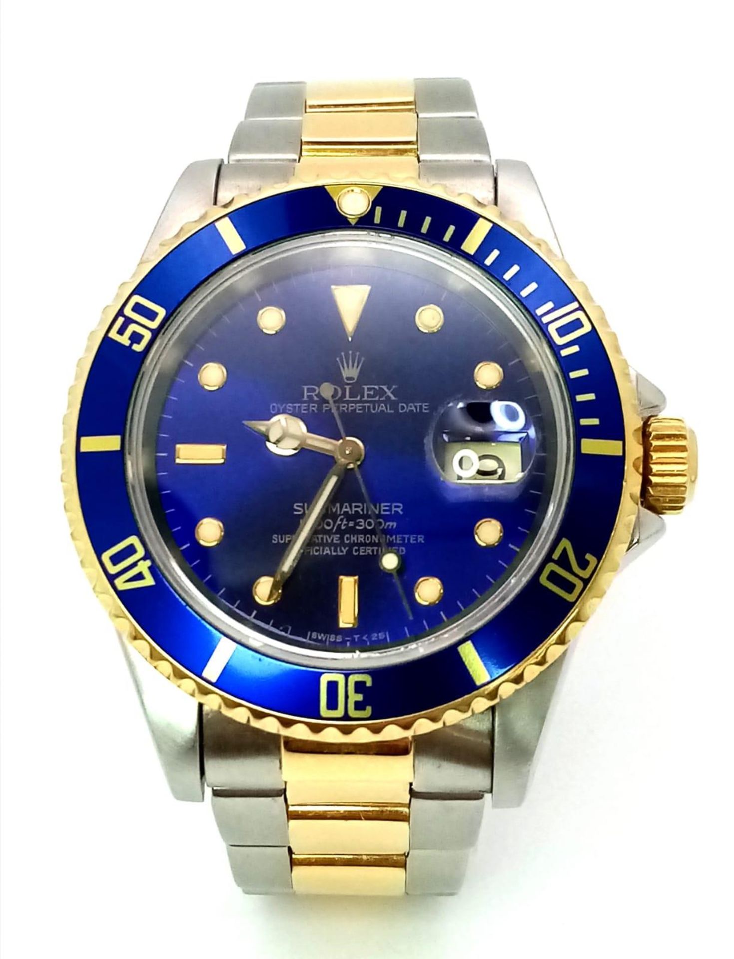 A Classic Rolex Bi-Metal Submariner Gents Watch. Bi-metal bracelet and case - 40mm. Midnight blue