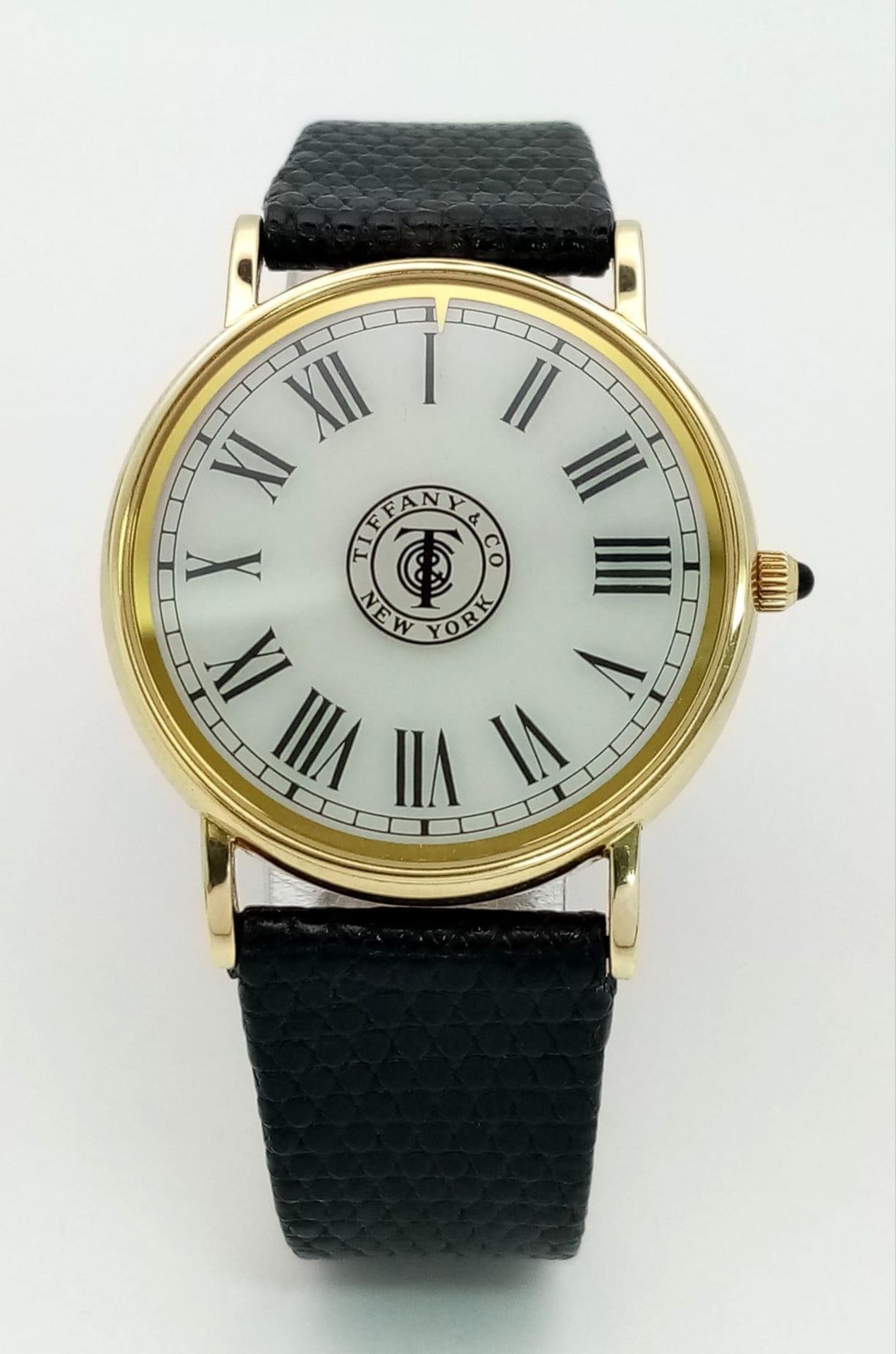 A Vintage 14K Gold Cased Tiffany and Co Ladies 'No Hands' Watch. Black leather strap. 14k gold - Bild 2 aus 9