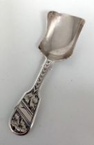 An Antique Sterling Silver Tea Caddy Spoon. Hallmarks for Birmingham - Victorian. 9cm. 9.67g weight.