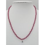 A Red Ruby Necklace with a 0.09ct Blue Diamond Pendant. A 925 silver clasp, 40cm length, 5.65g total