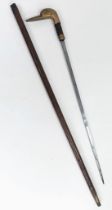 An Antique, Rare Design, Concealed Sword Stick with Duck Shape Brass Handle. Brass Ferrule Turns